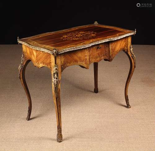 A 19th Century Marquetry Table in the manner of Edward Holme...