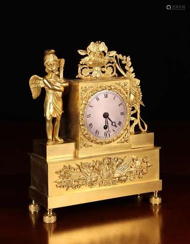 A Small French Gilt Brass Mantel Clock intricately cast with...