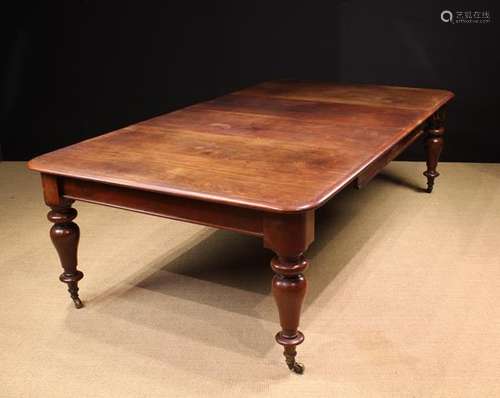 A Victorian Cuban Mahogany Wind-out Dining Table.