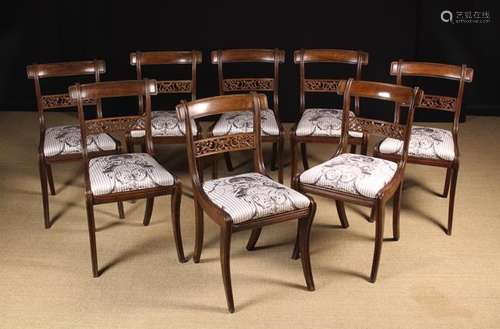 A Set of Eight Regency Simulated Rosewood Dining Chairs.