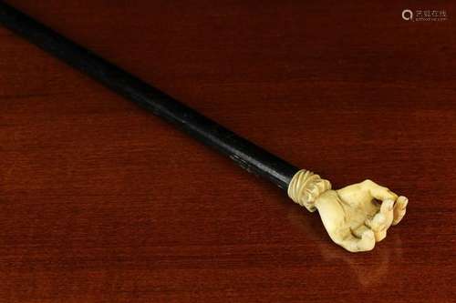 A 19th Century Back Scratcher having a carved ivory hand mou...