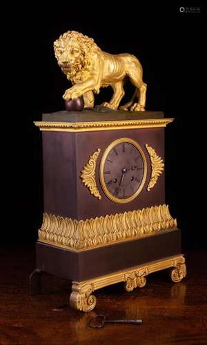 A 19th Century French Empire Bronze & Gilt Bronze Clock surm...