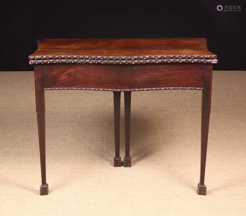 A George III Cuban Mahogany Fold Over Tea Table.