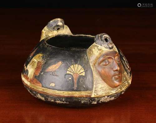 A Patinated Clay Bowl with Egyptianeque decoration.