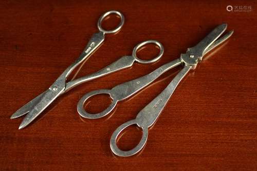 Two Pairs of Grape Scissors: One hallmarked Sheffield 1935 b...