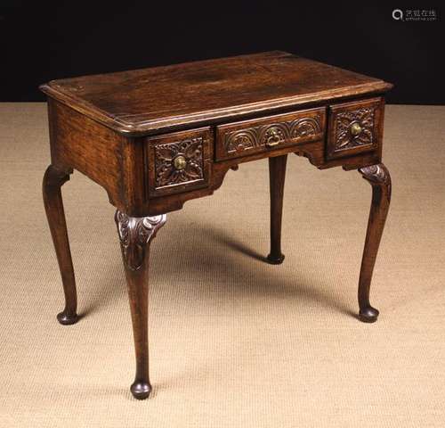 A 19th Century Oak Lowboy decorated with 17th century style ...