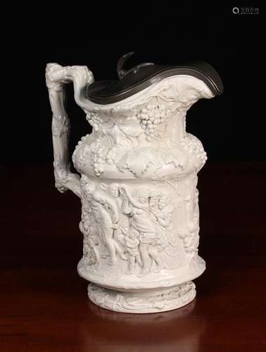 A Charles Meigh Relief Moulded Jug decorated with bacchanali...