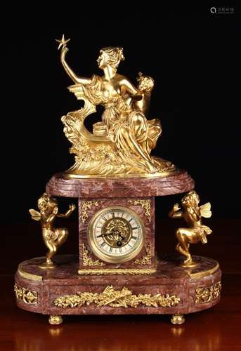 A Decorative Figured Marble & Gilt Bronze Mantel Clock.