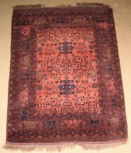 A Hand-tied Turkeman Carpet woven predominantly in a palette...