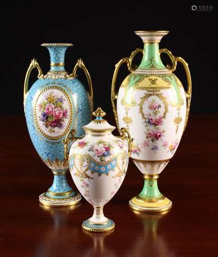 Three Royal Crown Derby Porcelain Urns with decorative ovoid...