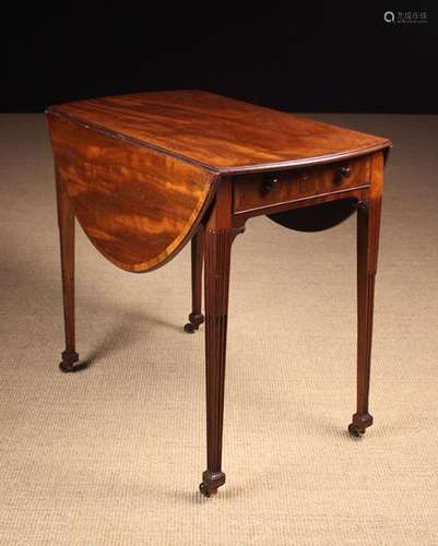 A Fine Late Georgian Mahogany Pembroke Table.