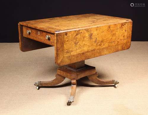 A Regency Burr Elm Veneered Drop-leaf Centre Table.