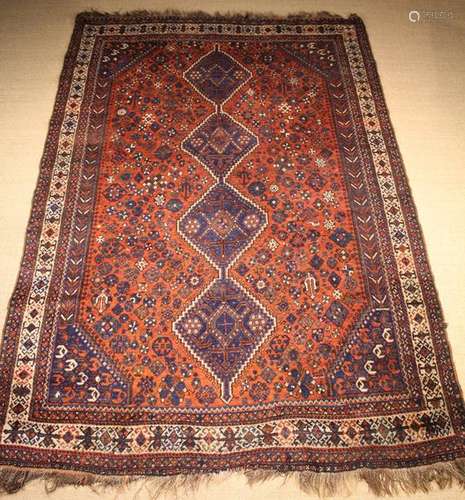 A Shiraz Wool Carpet woven with four linked blue ground diam...