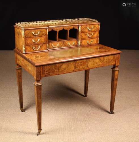 A Decorative Figured Walnut Bonheur-du-Jour inlaid with king...