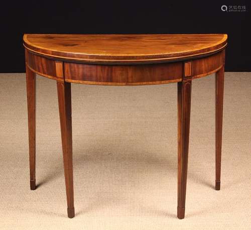 A Georgian Inlaid Mahogany Card Table.