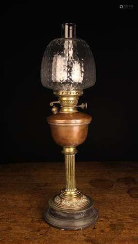 A Victorian Brass & Copper Oil Lamp with moulded clear glass...