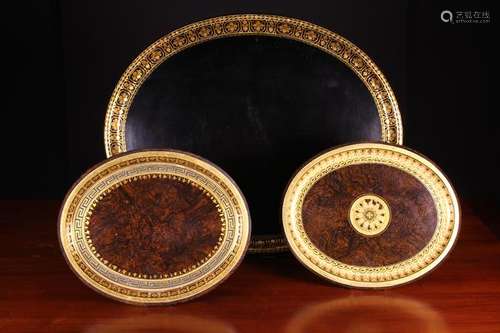 Three Attractive Oval Lacquered Papier-mâché Trays.