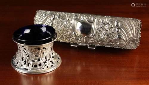 An Embossed Silver Penbox and a Blue Glass Condiment Dish in...