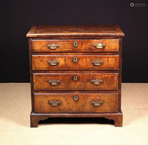 A Small Queen Anne Walnut Veneered Chest of Drawers.