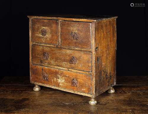 An 18th Century Miniature Painted Chest of Drawers.