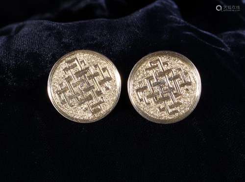 A Pair of Unmarked 18 Carat Gold Studs in presentation case.