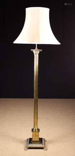 A Good Quality Brass Standard Lamp with cream silk shade.