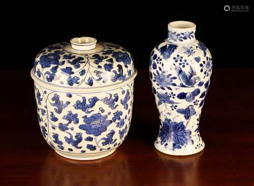 A Qinglong Blue & White Jar & Cover decorated with scrolling...