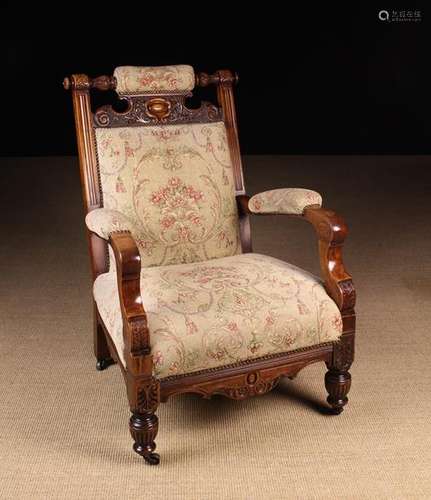 A Late Victorian Upholstered Arm Chair.