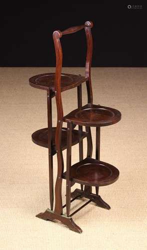 A Vintage Mahogany Folding Four-Tier Cake Stand.