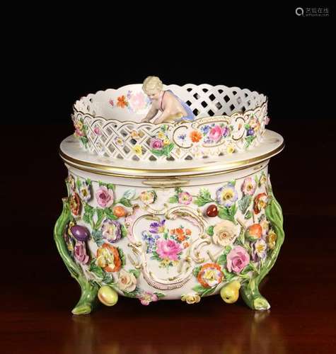 A Meissen Jardiniere encrusted with polychromed flowers,