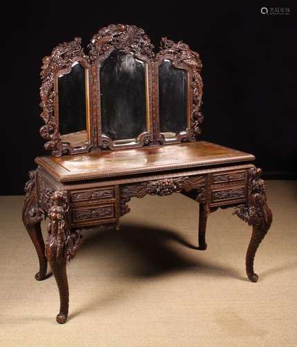 An Exuberant Carved Oriental Rosewood Dressing Table.