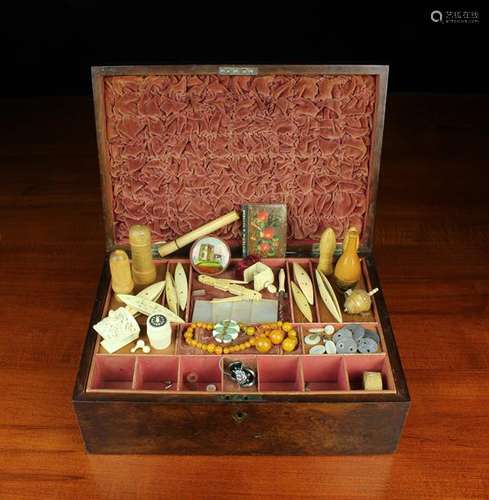 A 19th Century Amboyna Veneered Work Box of rectangular form...