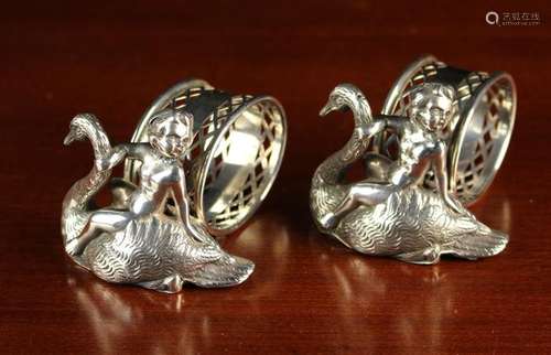 A Pair of Ornamental White Metal Napkin Rings.