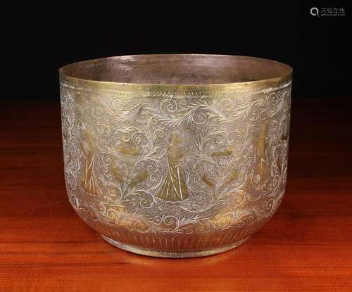 An Indian Brass Jardiniere decorated with engraved and chase...