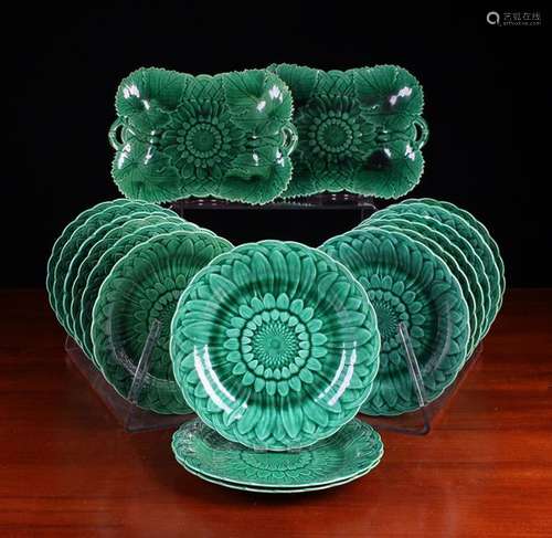 Fifteen Wedgwood Majolica Green Glazed Plates relief moulded...