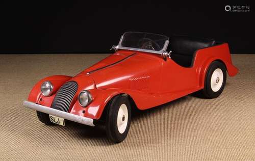 A Red Fibreglass Treadle-Action Toy Morgan +8 Sports Car wit...