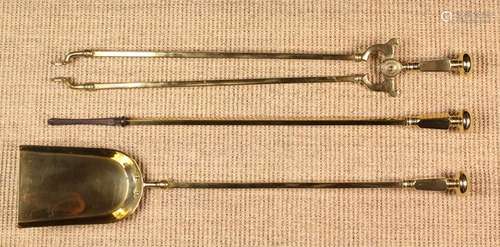 A Set of Brass Fire Tools: Poker, tongs and shovel with fini...