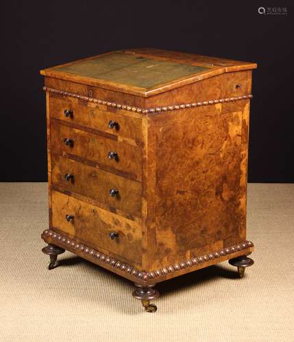 A Fine William IV Burr Walnut Davenport.