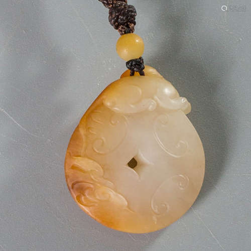 A Carved Hetian Jade Pendant