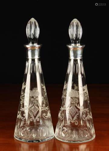 A Pair of Fine Quality Cut & Etched Glass Decanters with sil...