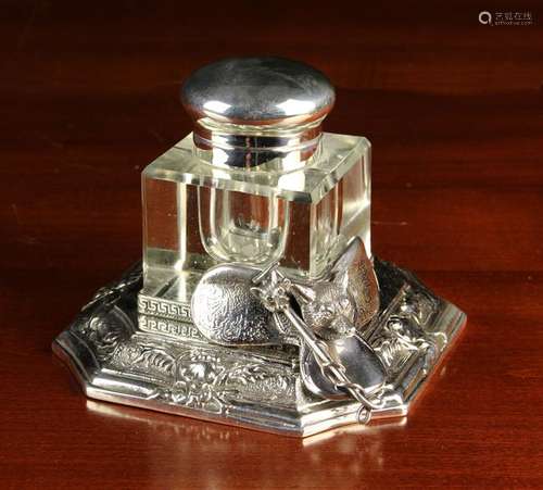 A Square Glass Inkwell with a hinged white metal dome lid mo...