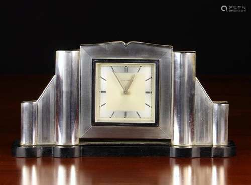 A Continental Art Deco Silver-clad Mantel Clock.