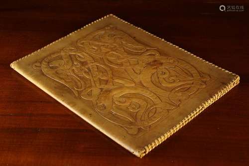 An Arts & Crafts Tooled Leather Folder;