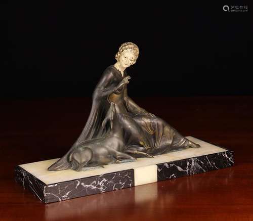 A Spelter Art Deco Figure of a Lady & Fawn.