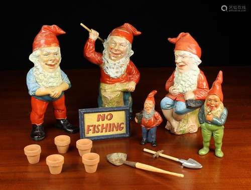 A Group of Painted Terracotta Garden Gnomes,