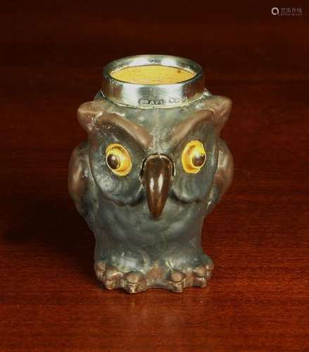 A Doulton Lambeth Stoneware Match Holder with silver rim.