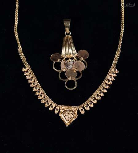 An Intricate Asian 22ct Gold necklace (11g) and an Asian 21c...