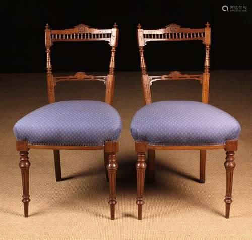 A Pair of Late Victorian Side Chairs having spindled gallery...