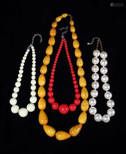 Four Boldly Coloured Necklaces, strung with large beads.