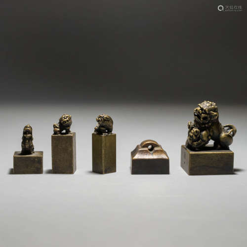 A Set of Bronze Handle Seals